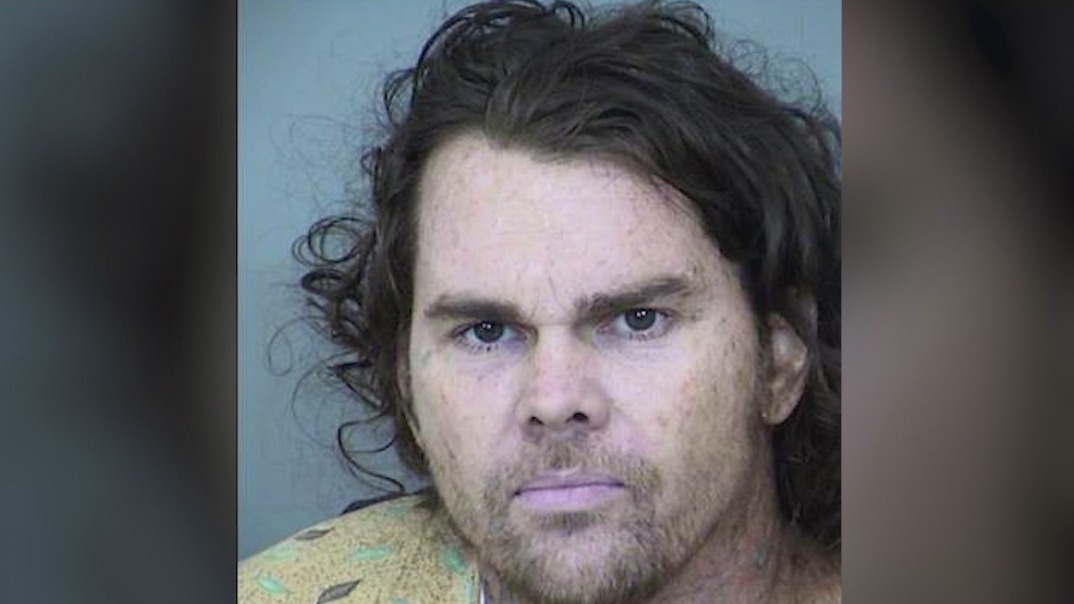 Man accused of ambush shooting of Phoenix Police officer pleads not ...