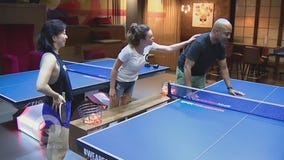 Quincy tries his hand at ping pong