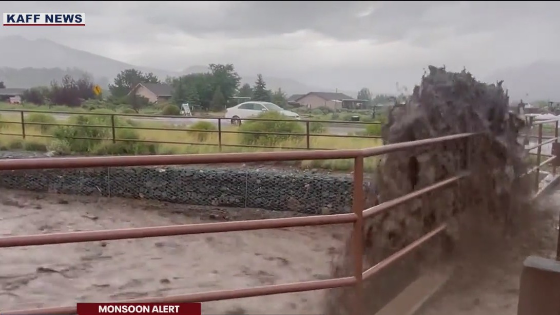 Raging floodwaters fill Flagstaff canal
