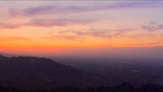 Sign of good luck? Phoenix Suns colors appear in the sky