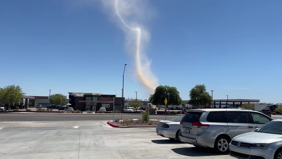 Dust devil shoots into the Arizona sky