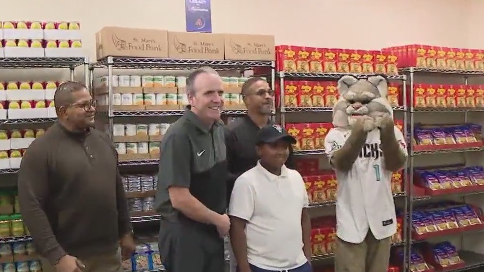 Phoenix boy cuts ribbon for school food pantry