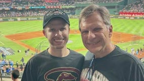Father-son duo cheer on D-backs in World Series, again