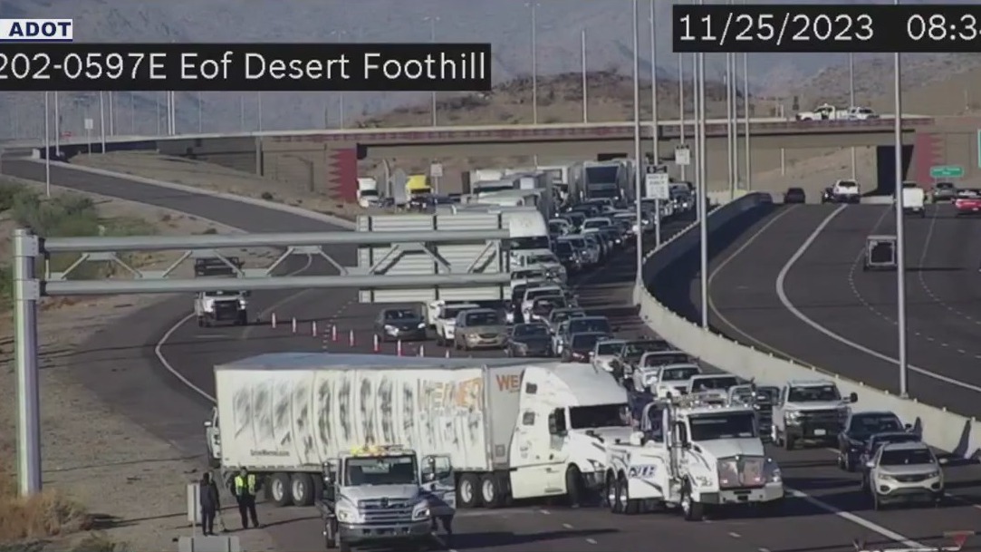 Semi truck rolls over Loop 202