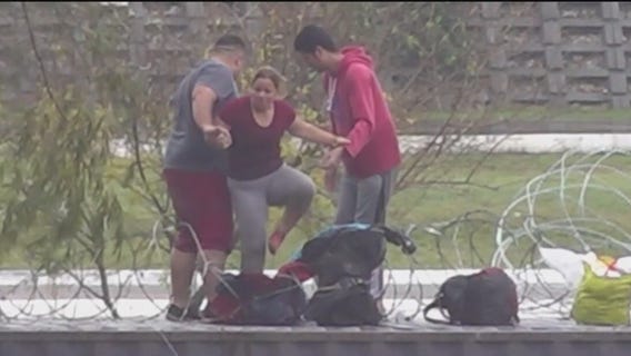 Migrants wait to catch trains in Mexico bound for USA