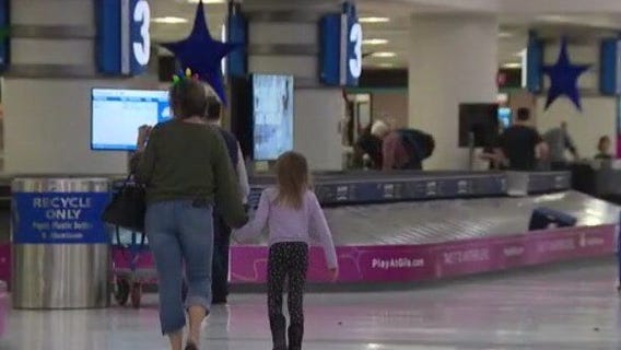 Busy holiday travel begins days before Christmas in Phoenix