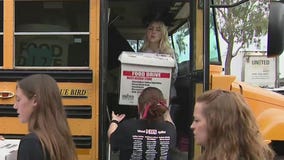 Gilbert students 'Stuff the Bus' with Thanksgiving donations
