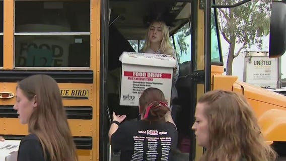 Gilbert students 'Stuff the Bus' with Thanksgiving donations