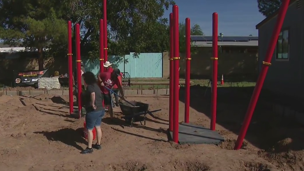 Volunteers build playground for Mesa children experiencing crisis