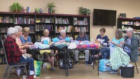 Giving back with busy fingers l Community Cares