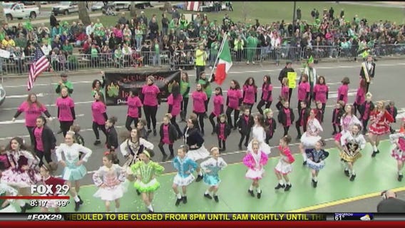 Ring of Honor members being honored by parade theme 'St. Patrick, protect & guide our police officers'