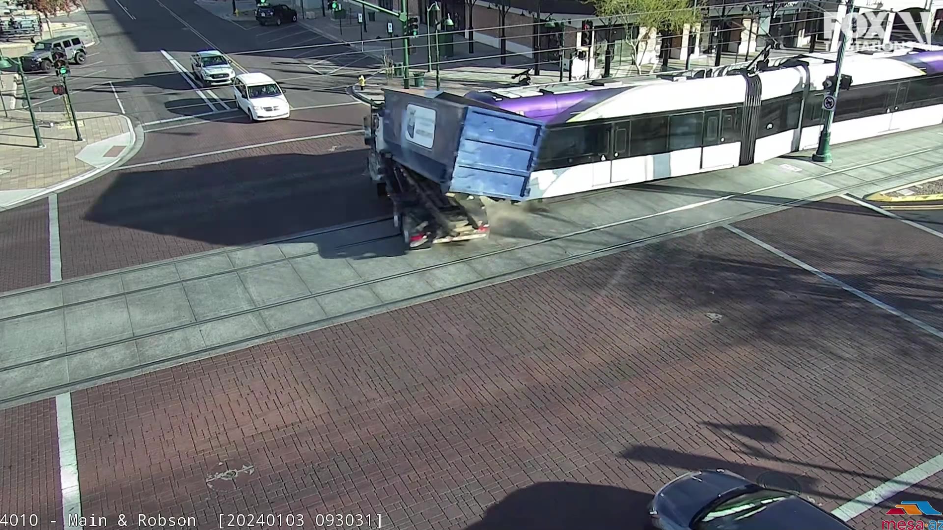 Mesa light rail crashes into garbage truck