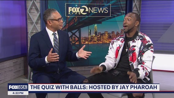 Jay Pharoah live in the KTVU studio, compares socks with Christien Kafton