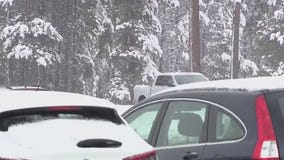 Snow blankets Flagstaff for a second day