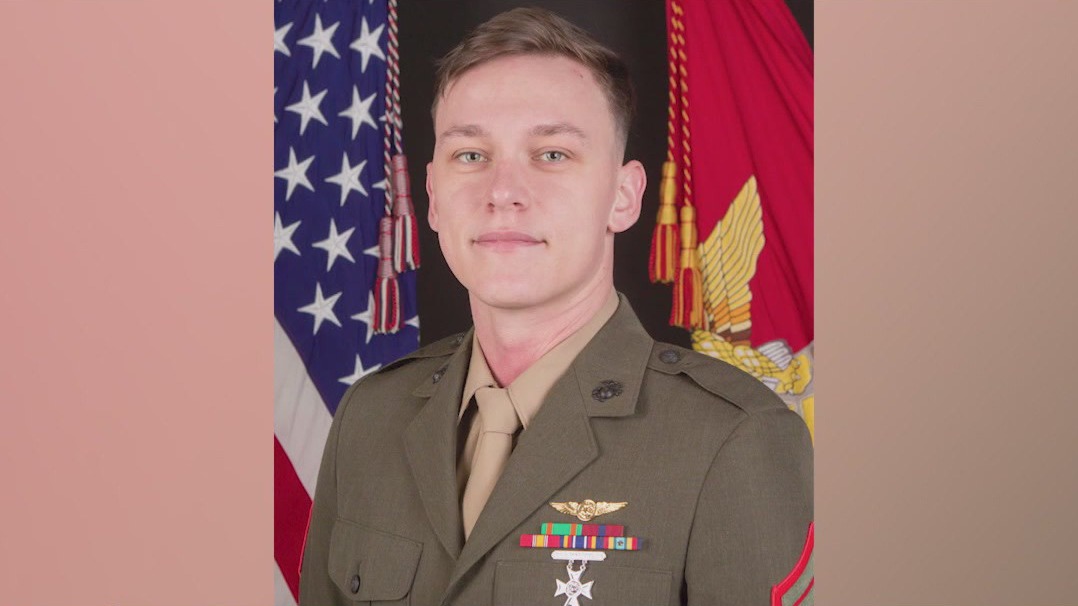 Flags lowered for fallen Arizona Marine