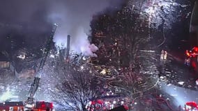 Virginia home explosion kills firefighter