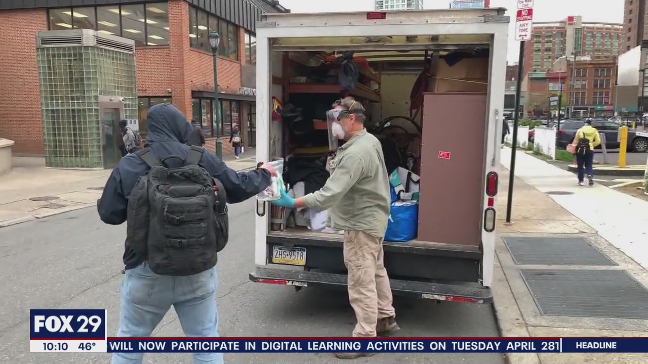 Volunteers hand out 'blessing bags' to the homeless