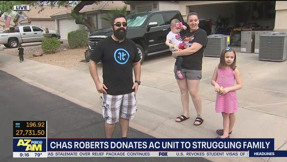 Chas Roberts donates A/C unit to Surprise family