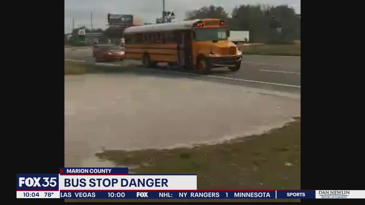 Bus stop danger as cars fly by stopped bus