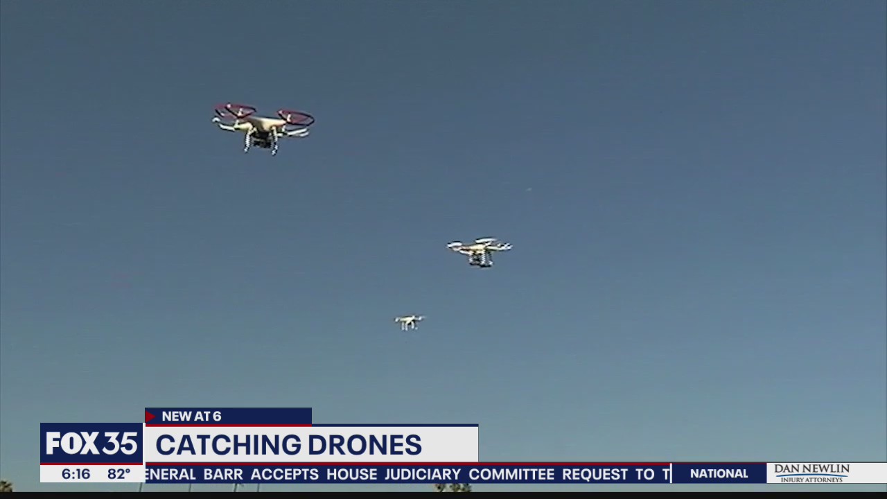 Drone Hunter system being used to capture rogue drones