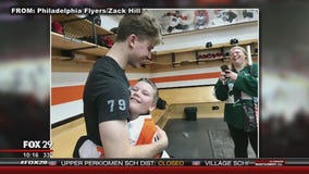 Boy who was inspiration for Flyers Carter Hart's jersey number meets idol