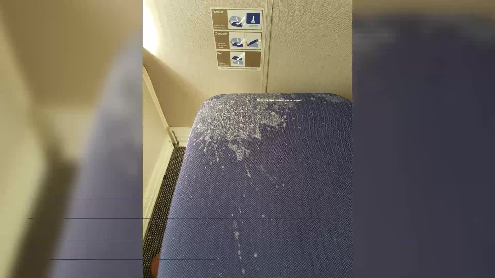 Flight passenger claims he had vomit-stained seat