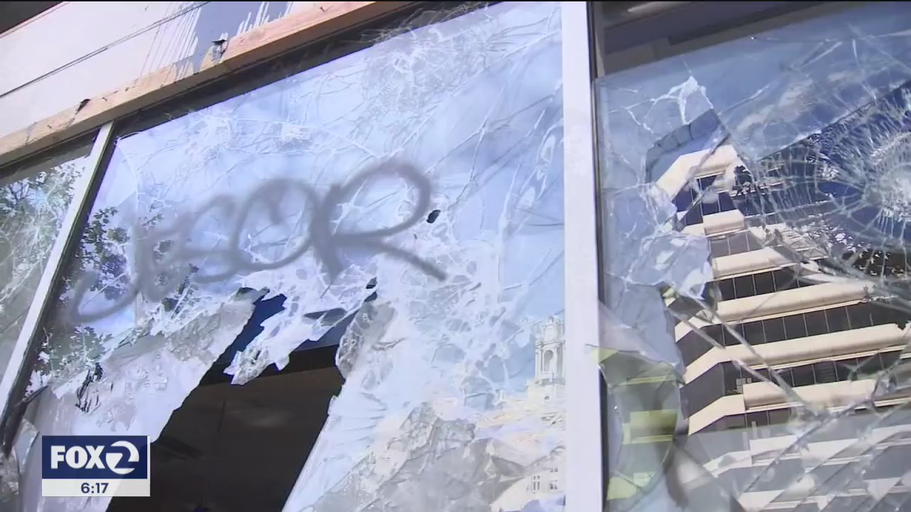 Small business owners in Oakland spend their Saturday cleaning up