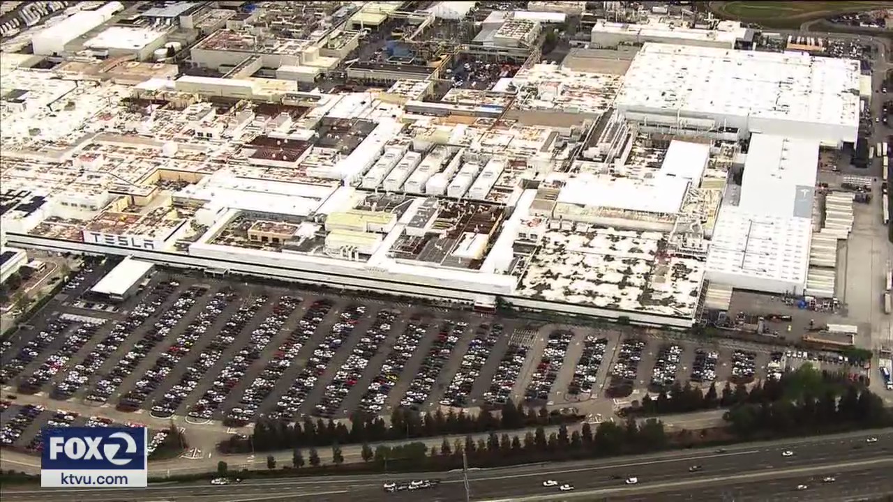 Thousands of Tesla employees still working at Fremont factory