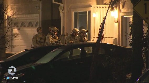 Four arrested in predawn raids in Oakland
