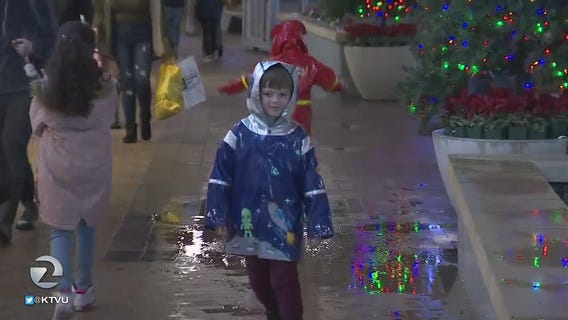 Shoppers brave the rain in Walnut Creek