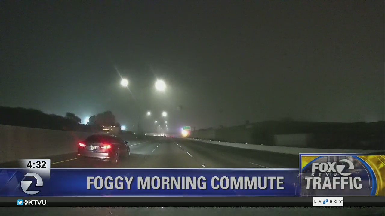 Dashcam view of a foggy morning in Oakland