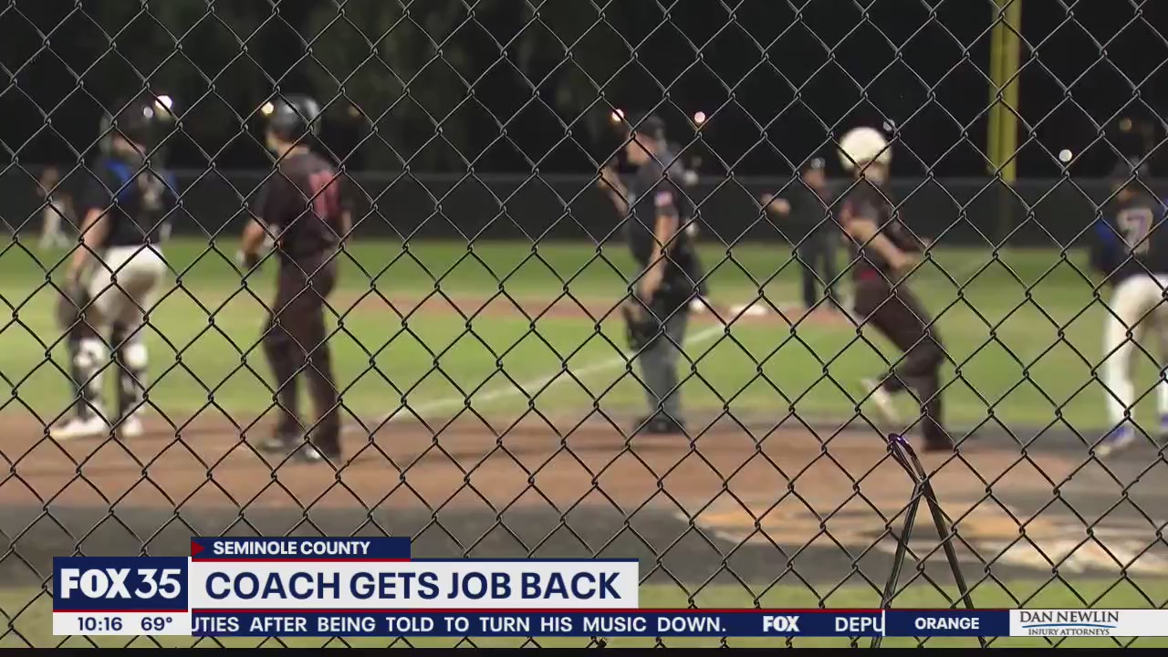 Coach gets job back
