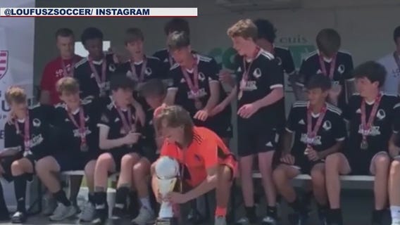 Soccer trophy breaks during team celebration