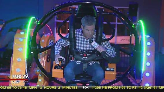 Bob Kelly rides the flip zone bumper cars at Urban Air