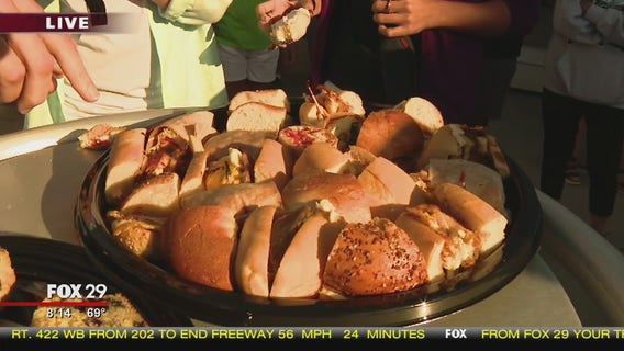 Bob Kelly and Shaina Humphries try local food in Sea Isle City