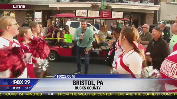 Bristol High School cheerleaders welcome Bob Kelly