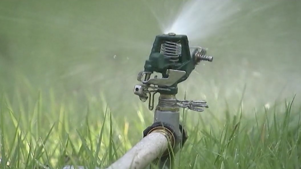 Preventing dust during overseeing