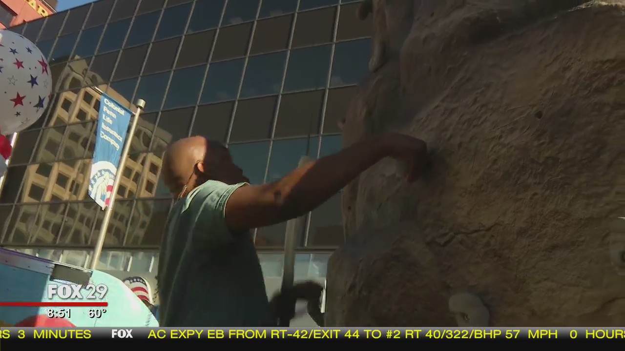 Quincy Harris takes on National Guard rock wall