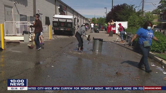 Heroes: West Philadelphia residents take to the streets to clean up after looting and rioting