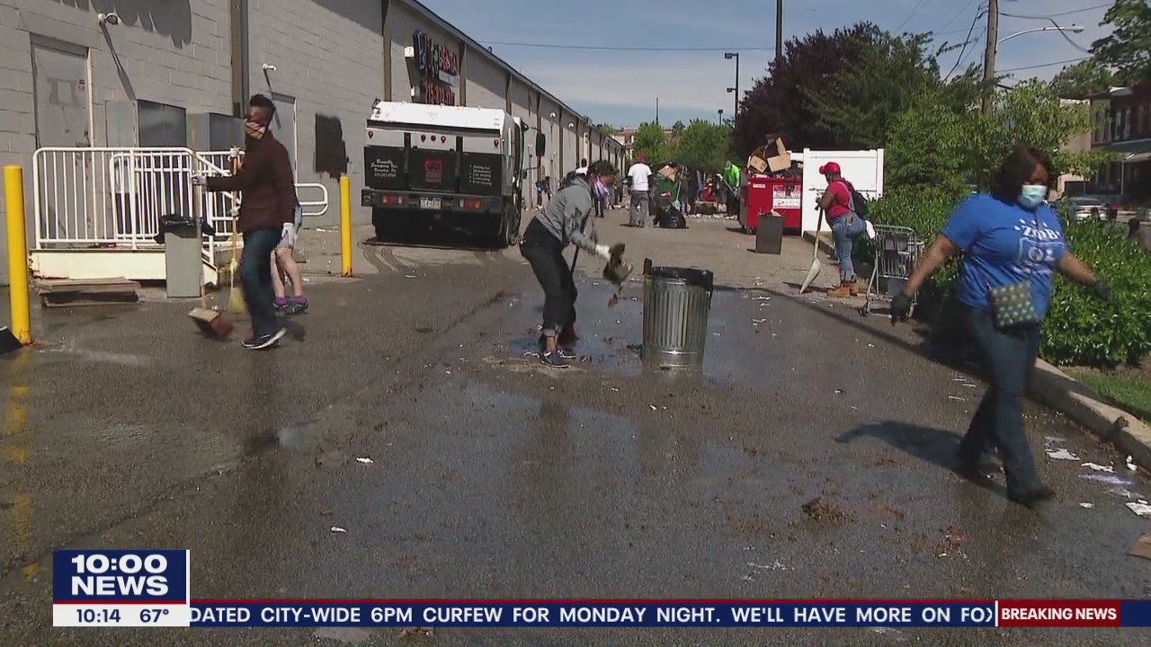 Heroes: West Philadelphia residents take to the streets to clean up after looting and rioting