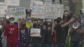 Monroe students walk out in protest over racism allegations