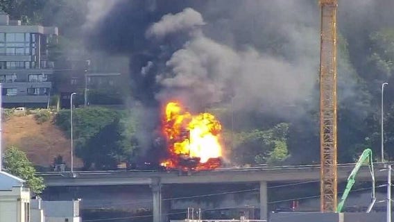 RAW VIDEO: Explosions after truck with liquid oxygen tanks catches fire on I-5 in Seattle