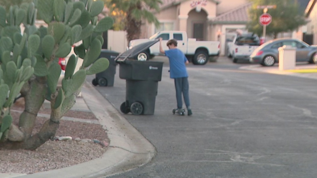Boy in Chandler encouraging people in the community to recycle properly