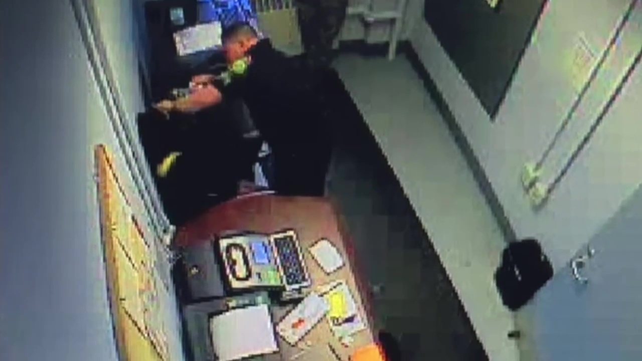 JBLM officer seen on video trying to force DNA sample from soldier