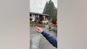 Natural gas explosion destroys home in Washington, shatters windows and sends garage door flying