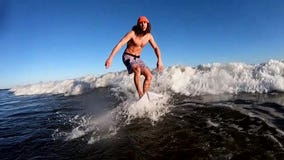 Local surfer sets goal to hit the waves every single day