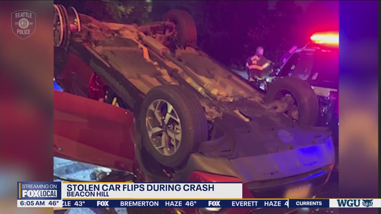 WATCH: Stolen car flips onto Seattle Police car