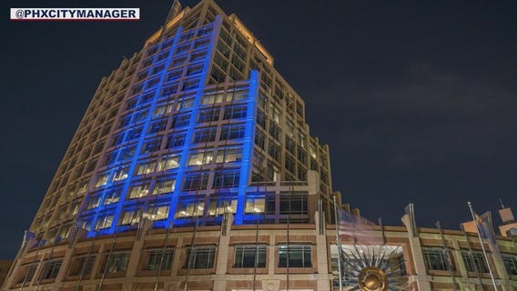 Phoenix City Hall lights up blue and yellow in support of Ukraine