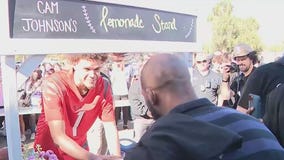 Suns fan line up at Phoenix park to see Cam Johnson serve up lemonade after LA Rams won the Super Bowl