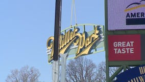 Miller Park sign comes down from structure outside of stadium